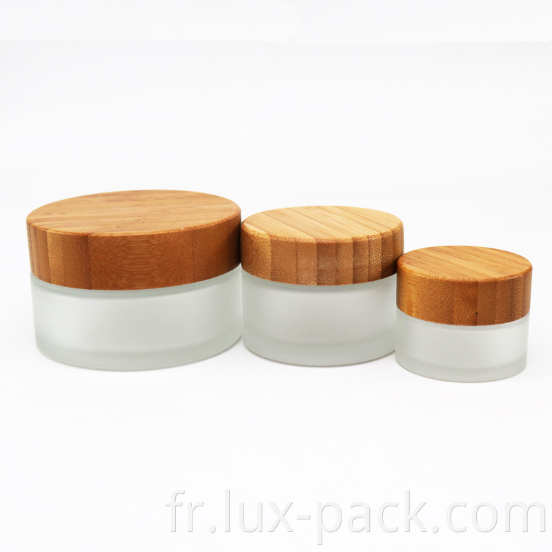 Vente chaude Face Grosted Cream Cosmetic pots en verre Pocs en verre avec bonnet en bois Gravure de bambou couvercle